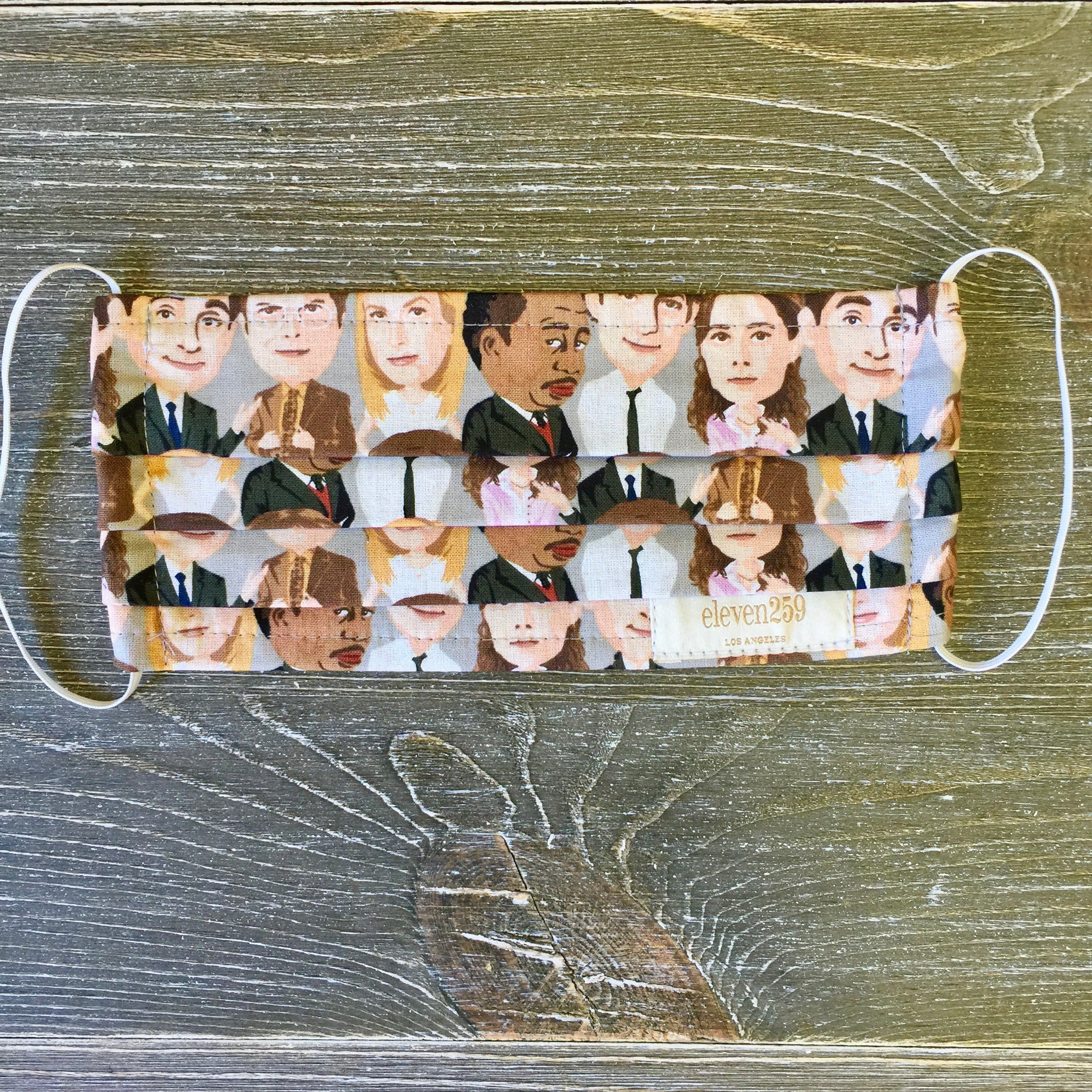 Face mask with the characters from "the Office".  Pam, Dwight, Jim, Angela and Stanley are featured on 100% cotton fabric.